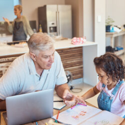 learning-girl-and-grandpa-care-in-a-kitchen-while-2023-11-27-04-53-34-utc